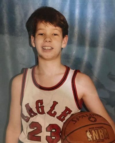 Picture of Ike Barinholtz with basket ball on his hand when he was thirteen.